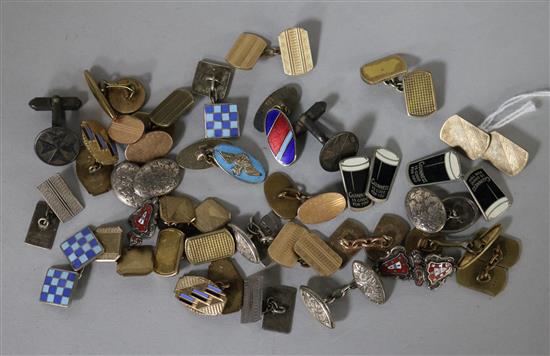 A collection of silver and novelty cufflinks.